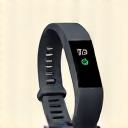 Icono estilizado de Fitbit tracker con indicador de sincronización.